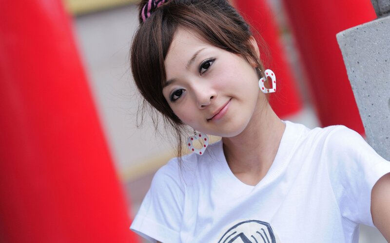 woman with heart earrings