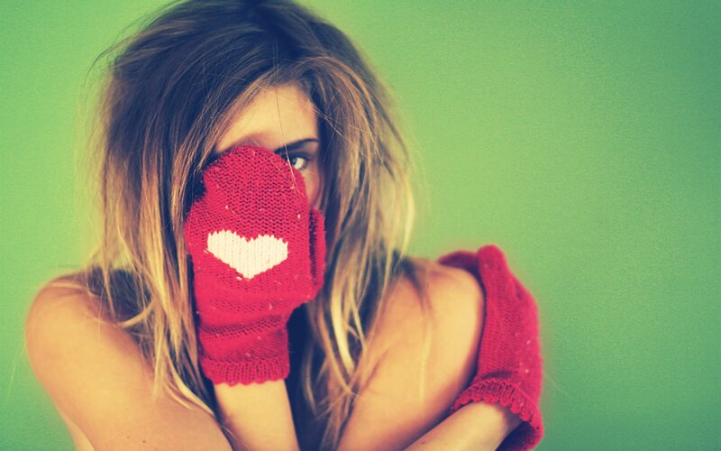 woman with heart mittens