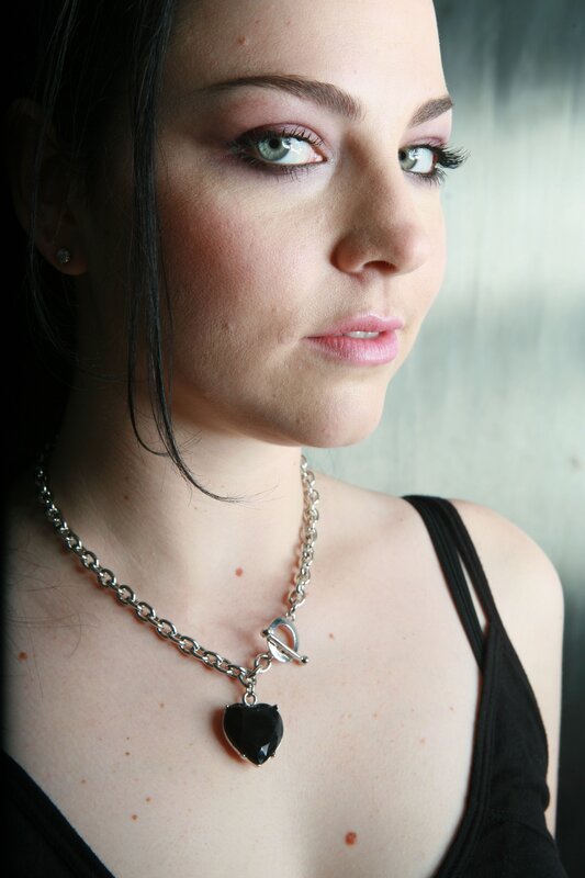 woman with heart necklace