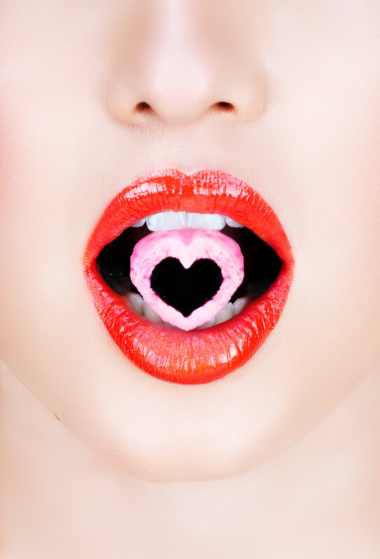 woman with heart-shaped candy