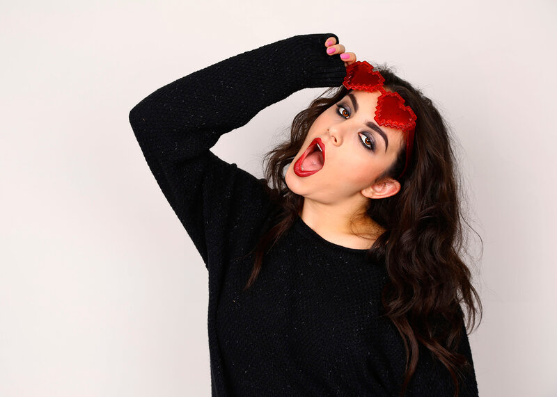 Woman with Heart-shaped Glasses — Black