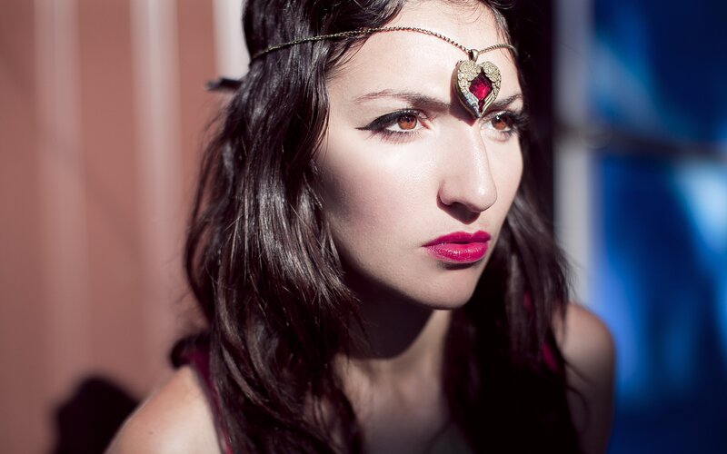 woman with heart-shaped headpiece
