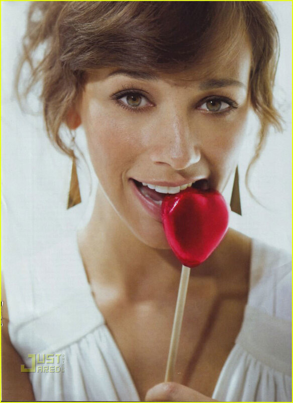 woman with heart-shaped lollipop