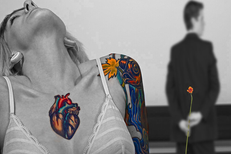 woman with heart tattoo