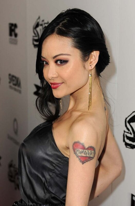 woman with heart tattoo