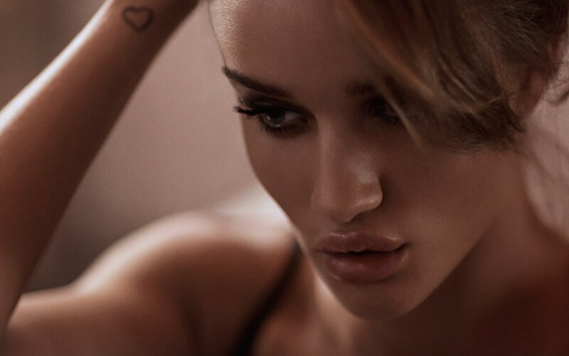 woman with heart tattoo