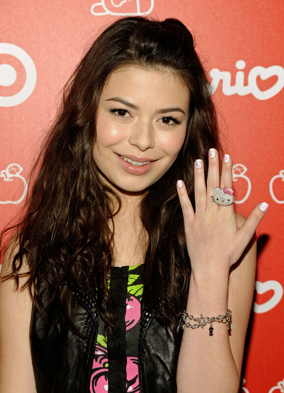 woman with hello kitty jewelry