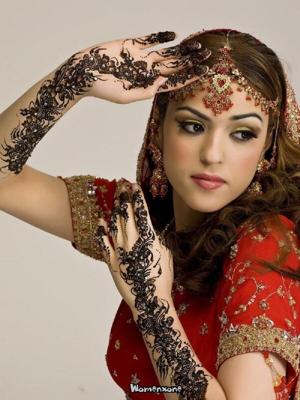 woman with henna and bridal makeup