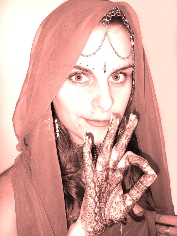 woman with henna and headscarf
