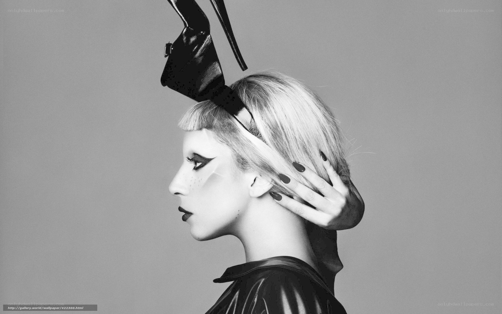 woman with high heels on head