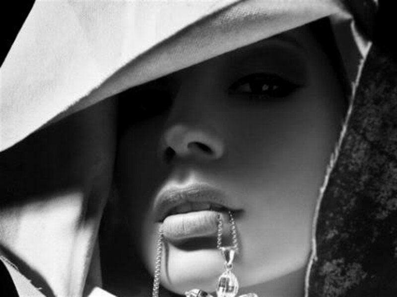 Woman with Hood and Pendant