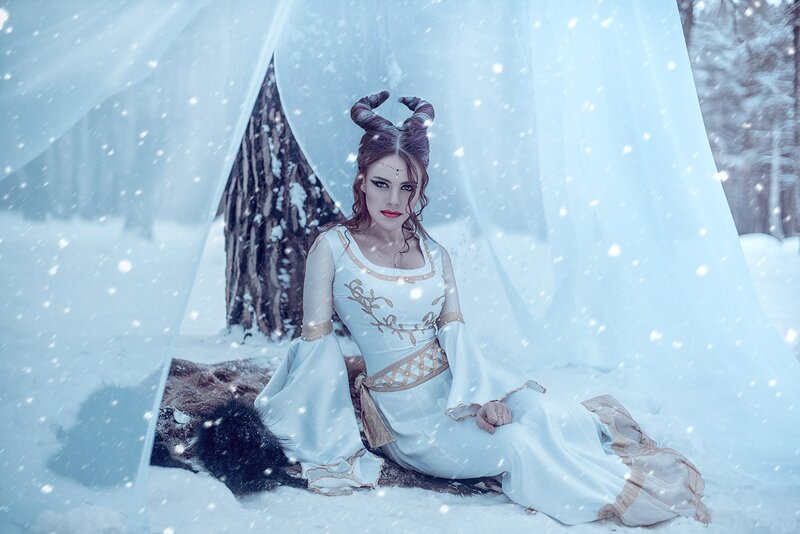 Woman with Horns in Snow — White