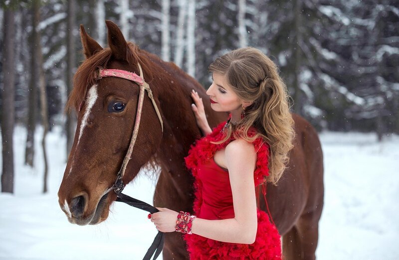Woman with Horse in Snow — Red