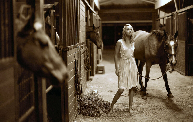 Woman with Horse in Stable — Sepia, Dramatic