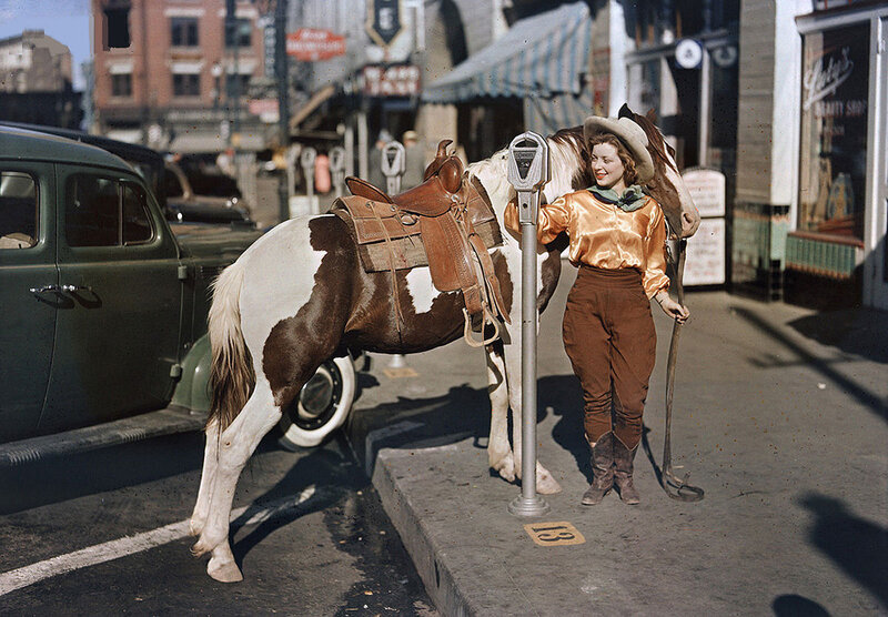 Woman with Horse on Sidewalk