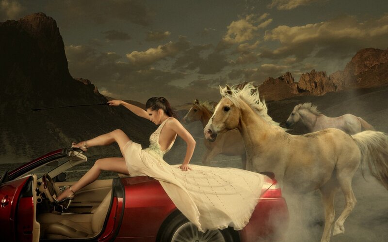 woman with horses in desert