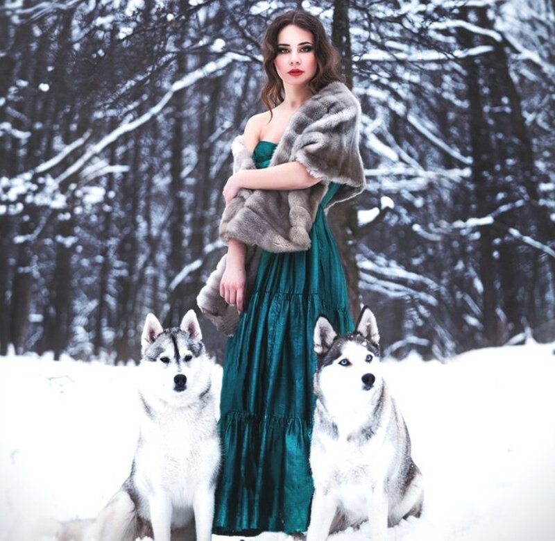 Woman with Husky Dogs — Green, Dramatic