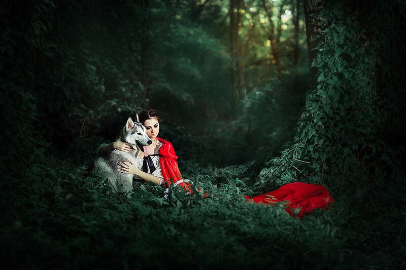 Woman with Husky in Forest