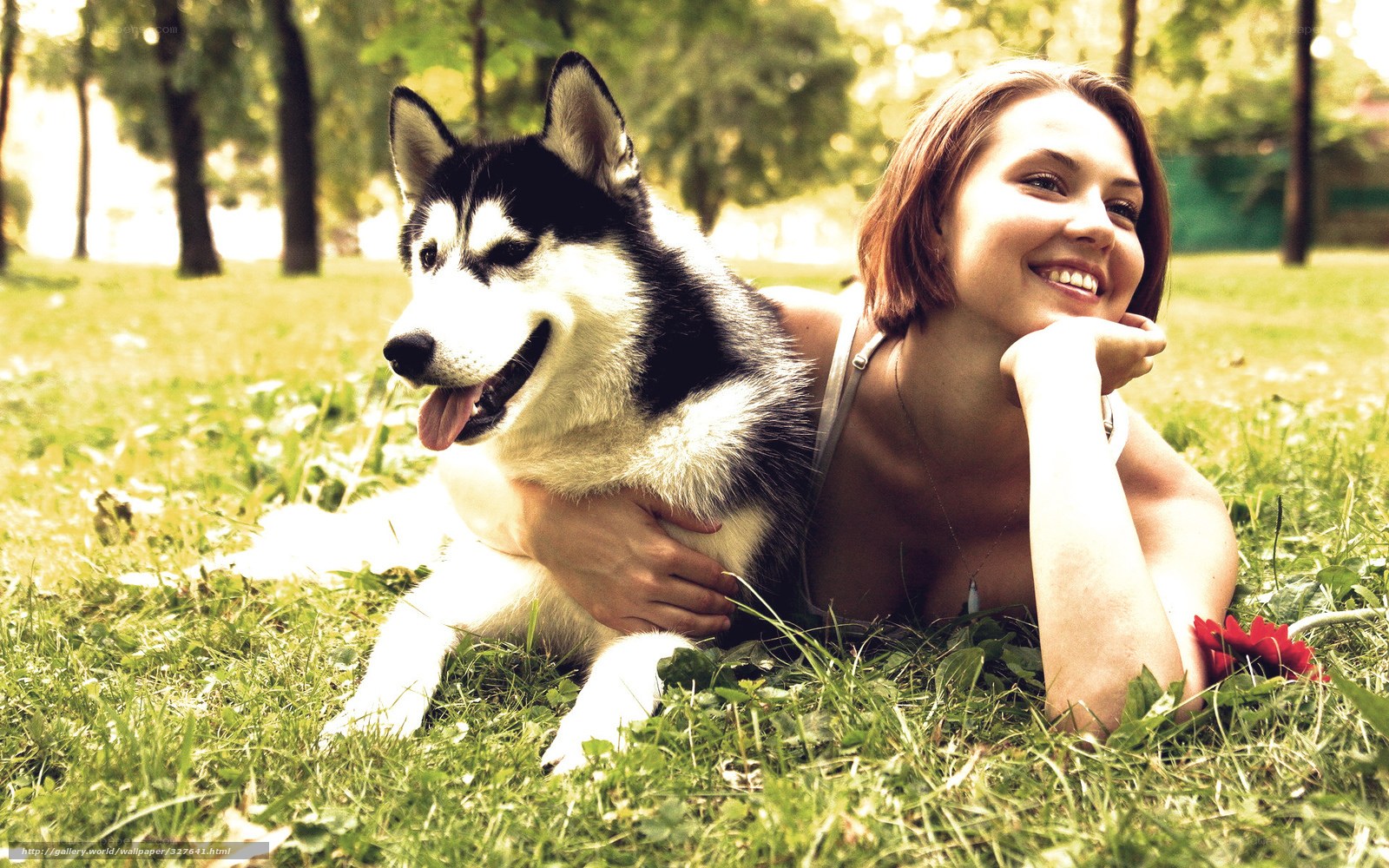 Woman with husky in park