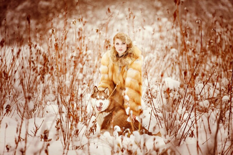 Woman with Husky in Snow — White, Dramatic, Winter