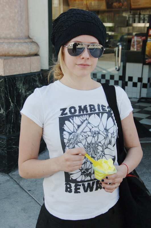 Woman with ice cream and sunglasses