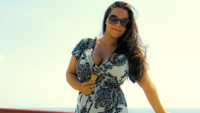 woman with ice cream at beach