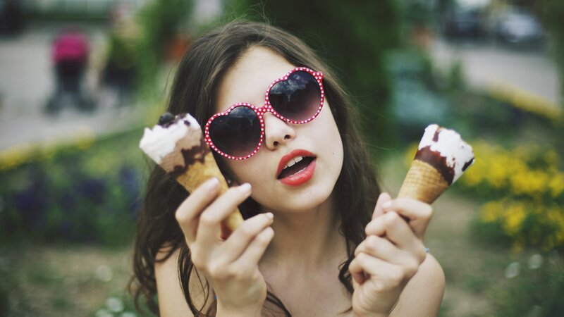 Woman with ice cream cones