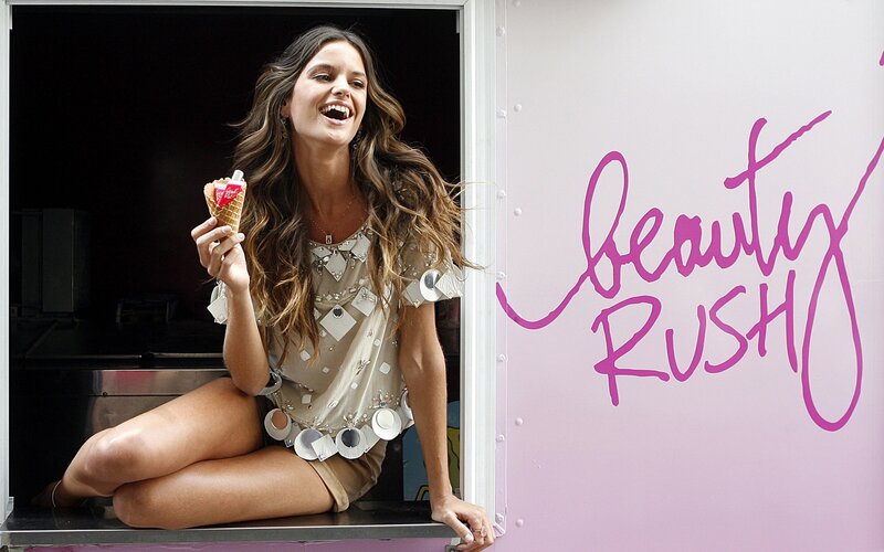 Woman with ice cream in truck