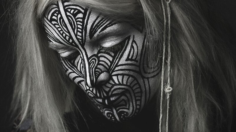 woman with intricate face paint