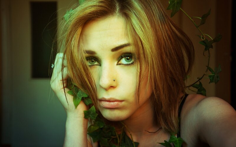 woman with ivy leaves