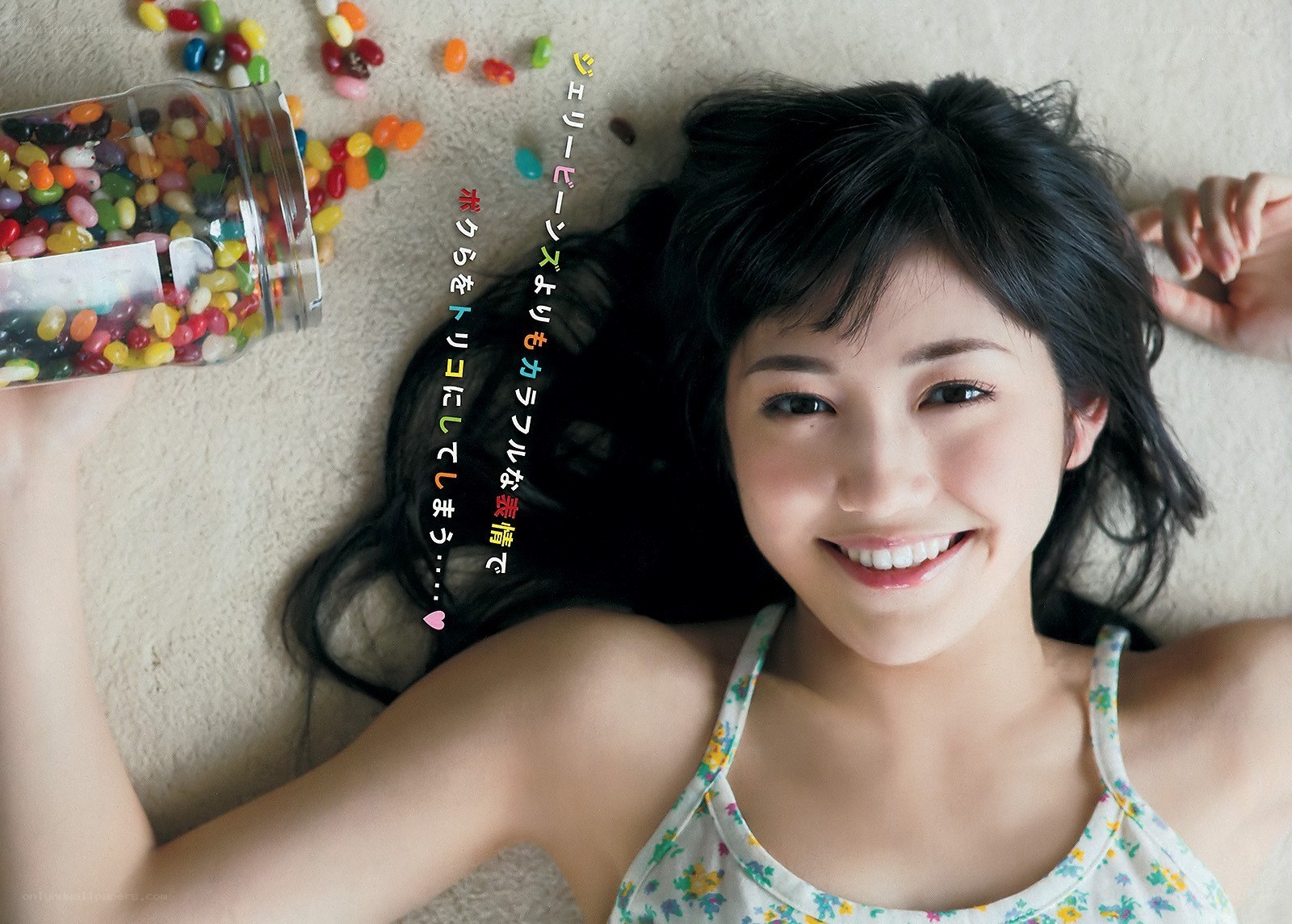 woman with jelly beans smiling