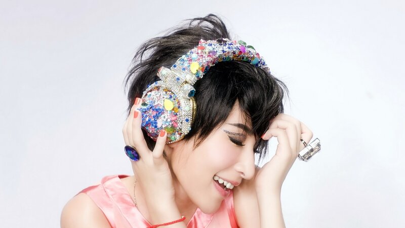 woman with jeweled headphones