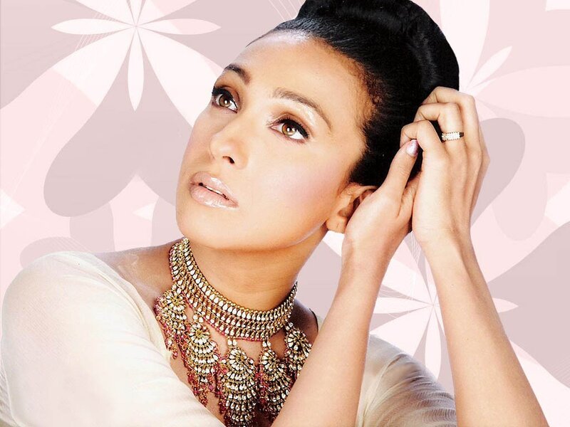 woman with jewelry and updo