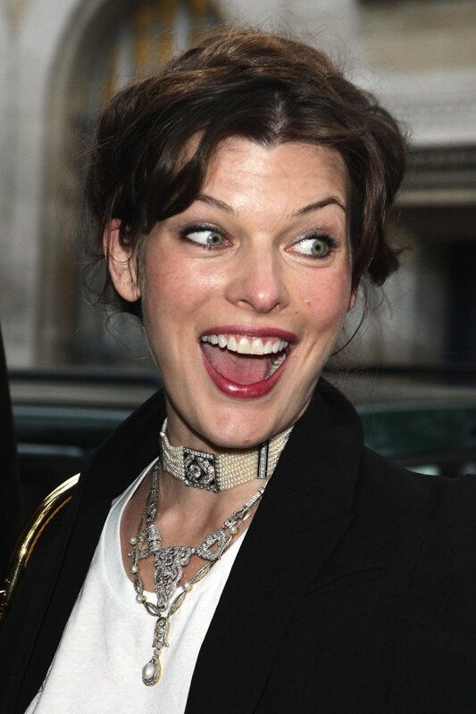 woman with jewelry smiling