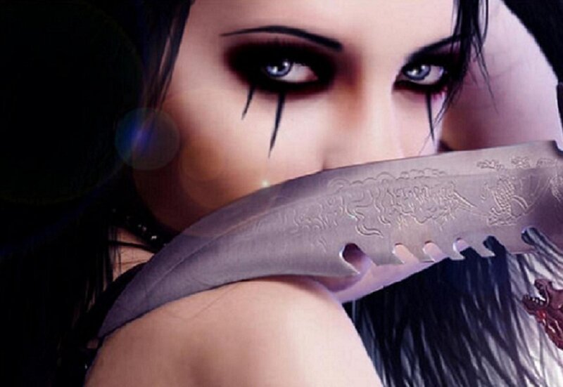 woman with knife and dark makeup