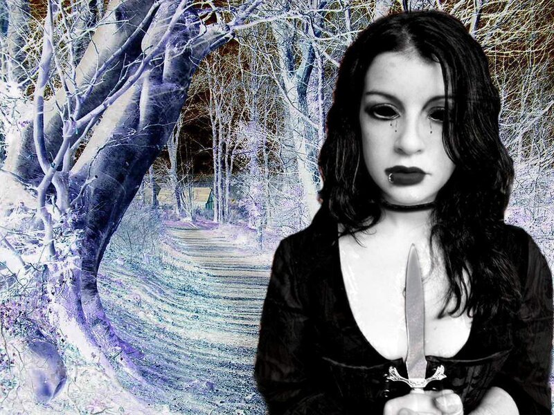 woman with knife in forest