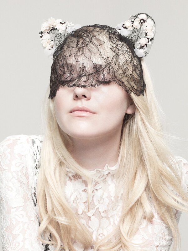 woman with lace mask and cat ears