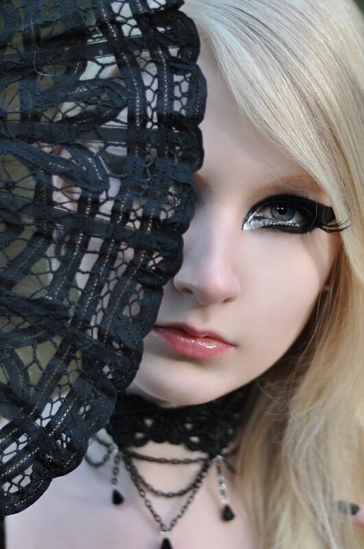woman with lace veil and gothic makeup