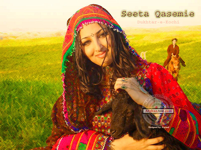 Woman with lamb in field