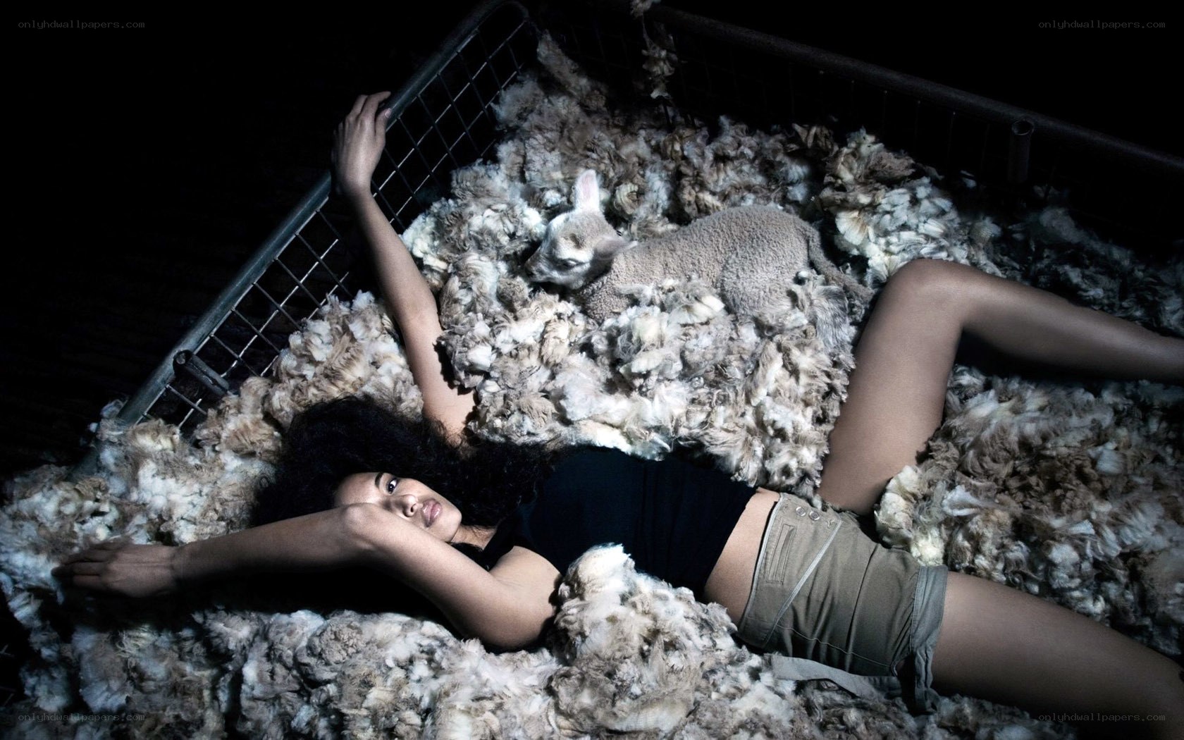 woman with lamb in wool