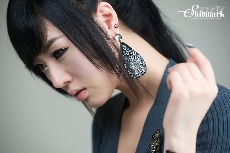 woman with large earrings