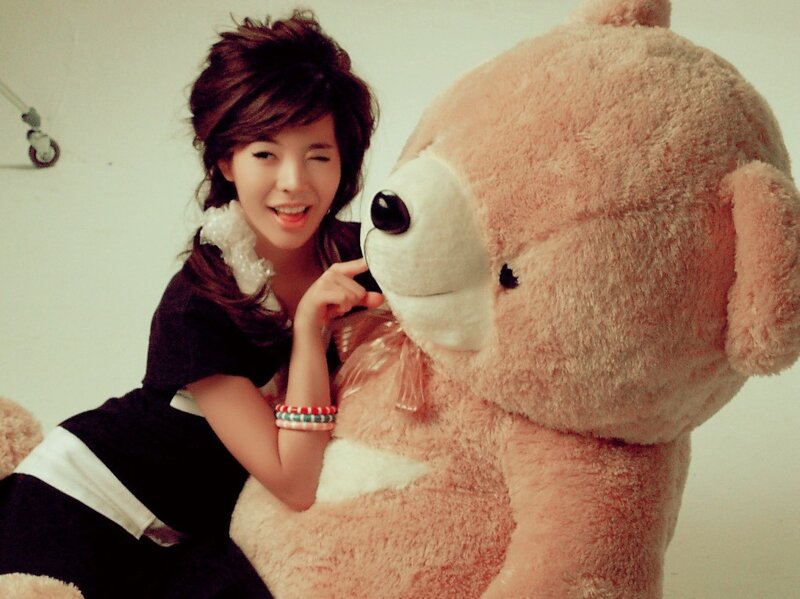 woman with large teddy bear