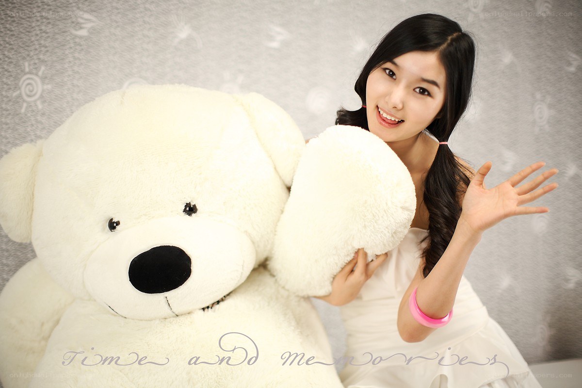 woman with large teddy bear