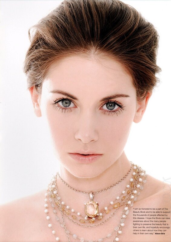 woman with layered necklaces
