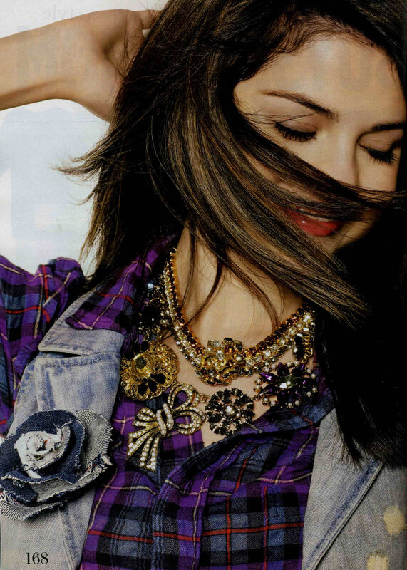 woman with layered necklaces