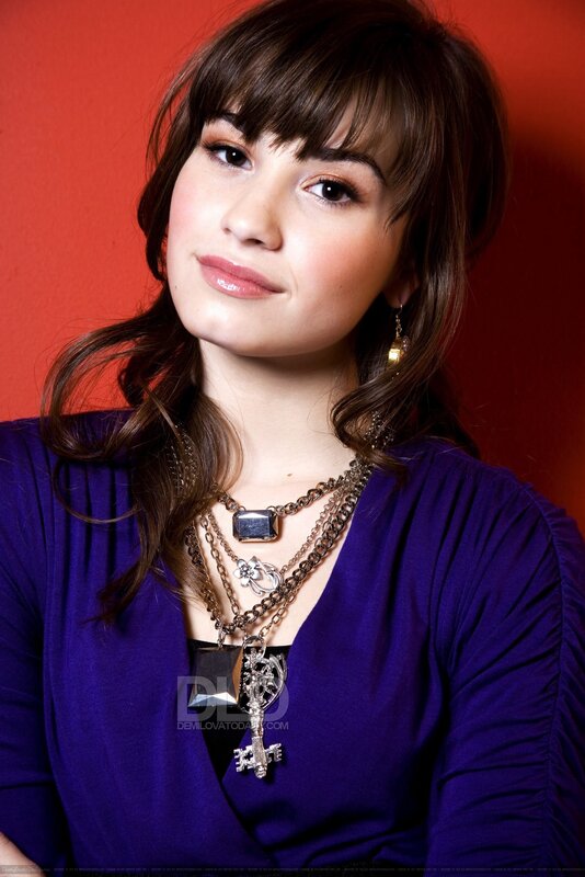 woman with layered necklaces