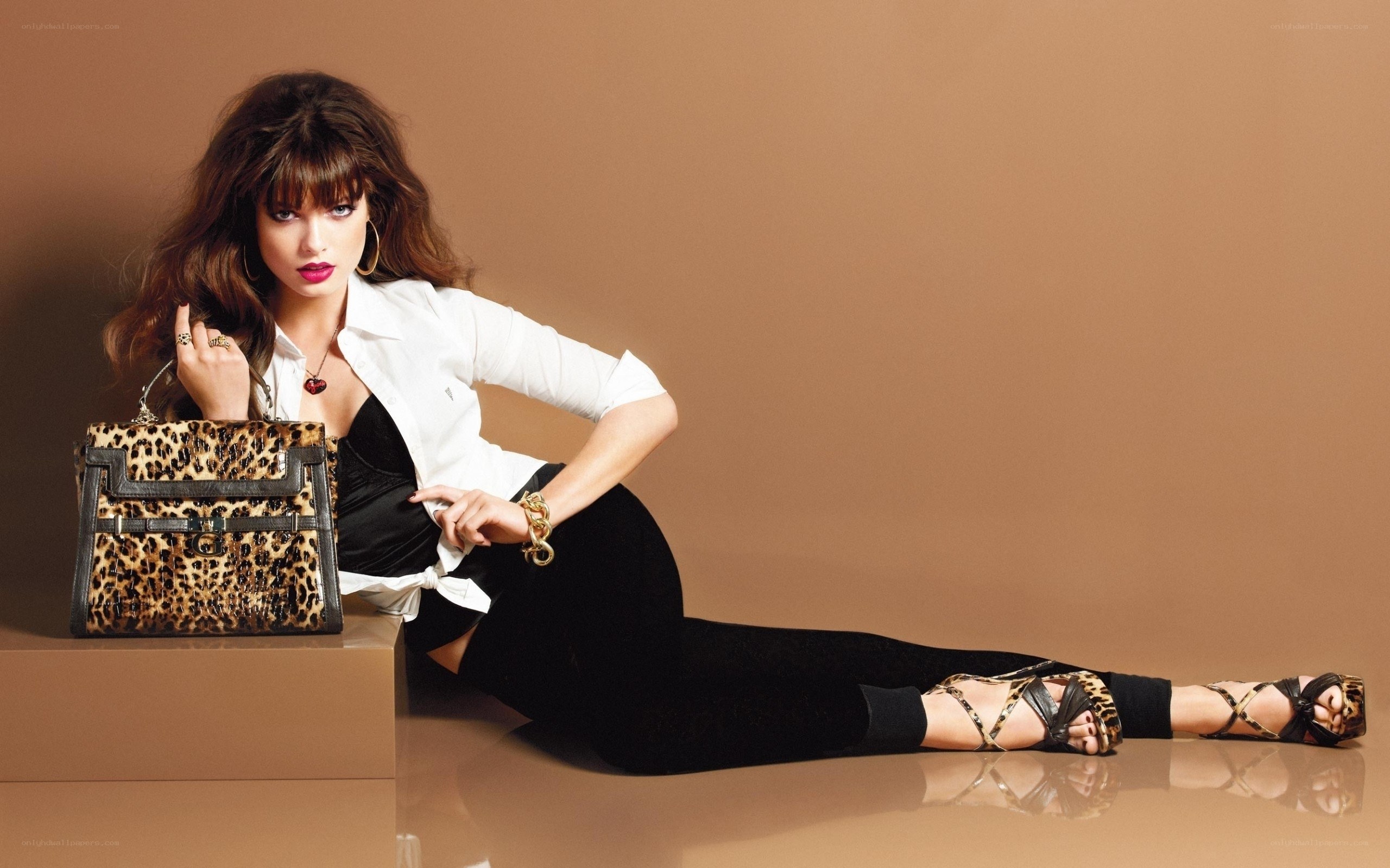 woman with leopard bag