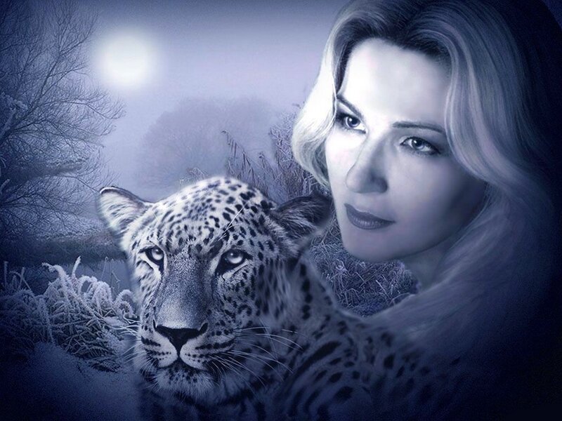 woman with leopard in moonlight