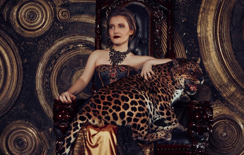 Woman with Leopard on Lap