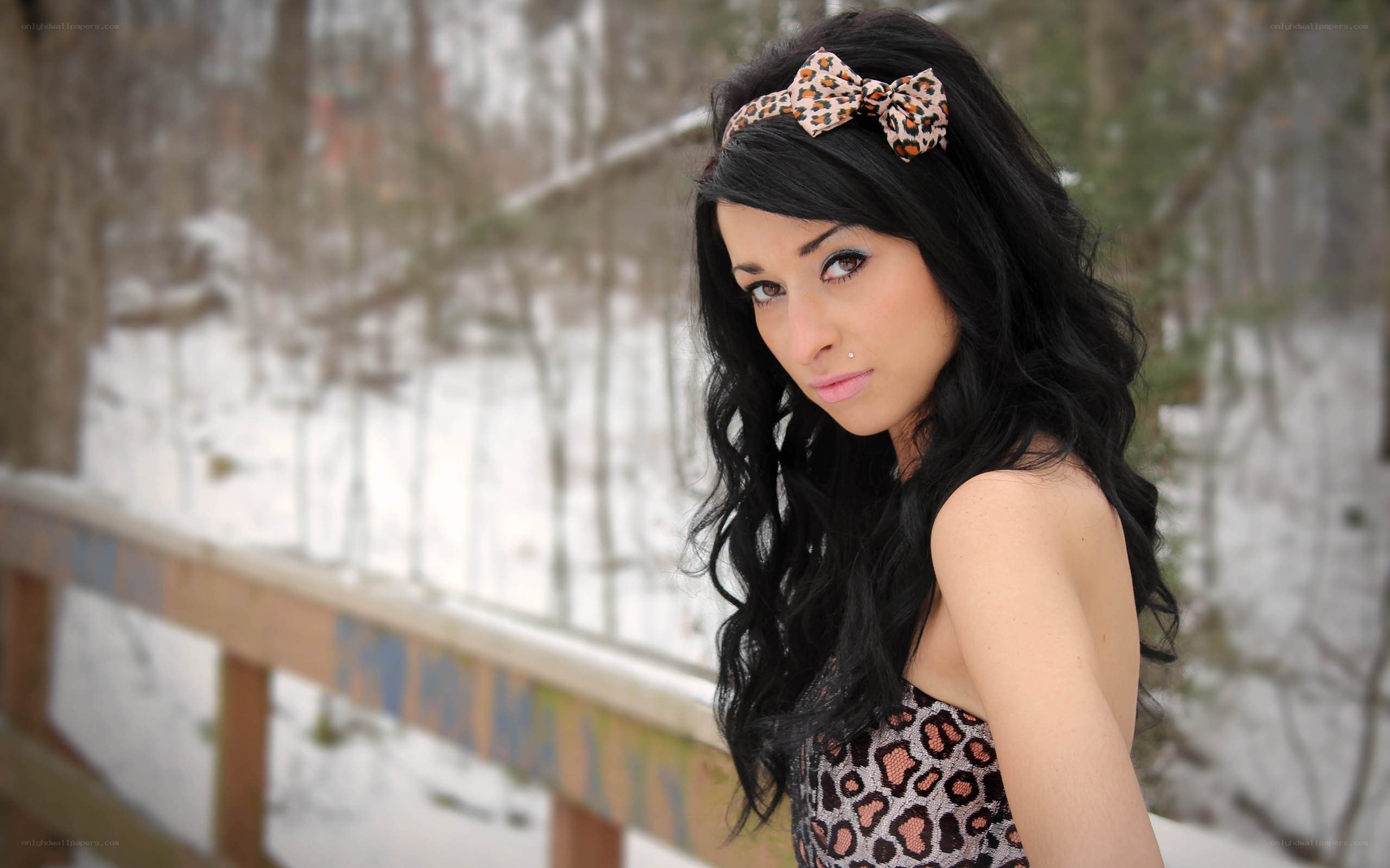 woman with leopard print bow